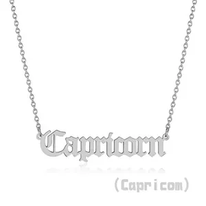 Detailed view of Capricorn zodiac pendant in cursive font on stainless steel chain