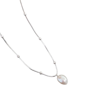 Minimalist stainless steel necklace with silver chain and white baroque pearl pendant