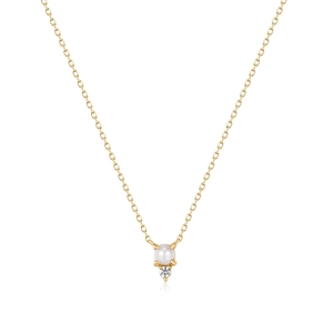 Detail of S925 silver necklace with elegant white pearl and small sparkling zircon stone