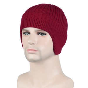 Close-up detail of burgundy knit beanie with thermal fleece lining for winter warmth