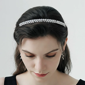 Exquisite silver headband with zircon leaf design worn by model for high-end fashion styling