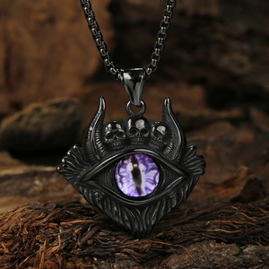 Detailed close-up of punk skull pendant with purple evil eye on rustic wood background