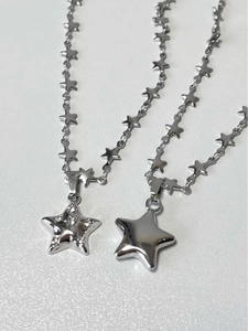 Vintage Y2K star pendant necklace with star-link chain and sparkling rhinestone details