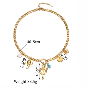 Detailed view of 18K gold plated multi-charm necklace with charms size and chain length marks