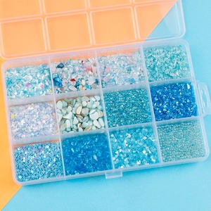 12-grid box with blue and white sequins, crushed stones and pearls for DIY nail art