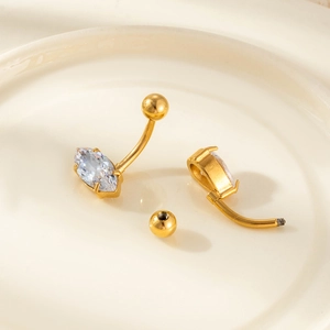Golden stainless steel belly ring with navel piercing barbell and marquise zirconia