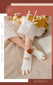 Thick warm coral fleece cat claw socks for women shown in a cozy home setting