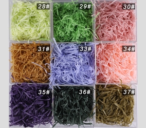 Detailed grid view showcasing various colorful shredded paper fillers for gift packaging