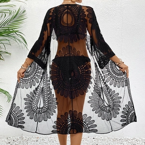 Detailed macro view of black lace embroidery texture and geometric hollow patterns