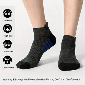 Detail of breathable low cut sport socks for men featuring arch support and grey knit design