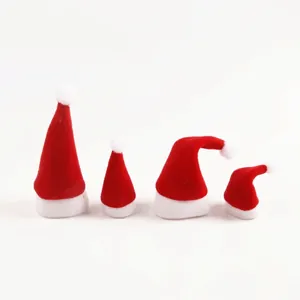 Set of four mini Christmas hats for wine bottles and cutlery decorations in red and white