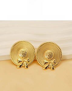 Détails de boucles d'oreilles en acier doré 18 carats avec texture de nœud
