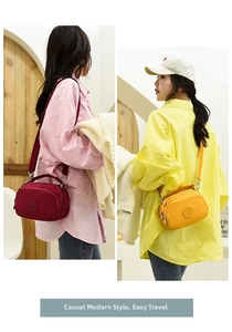 Detail view of burgundy and yellow nylon crossbody bags with multiple zipper compartments