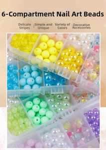 Close-up of 6-grid storage box with colorful green and pastel DIY craft beads