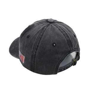 Detail of vintage washed baseball cap featuring American flag embroidery and adjustable buckle
