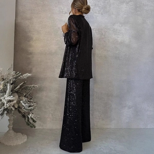 Chic black sequin two-piece blazer set with wide-leg trousers for high-fashion formal wear