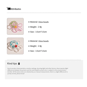 Detail view of handmade glass bead flower rings with size and weight specifications