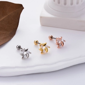 Three-color stainless steel flower earrings with zircon stones on stone pedestals