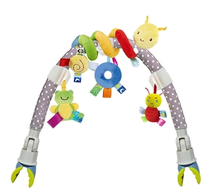 Detail view of baby stroller arch with colorful plush bee and frog hanging toys