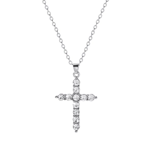 Minimalist silver cross necklace with shimmering inlaid rhinestones on a white background