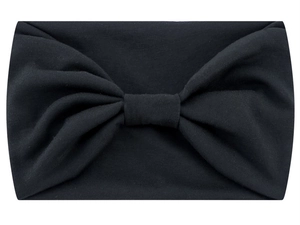 Detail shot of the knotted soft fabric texture on a black wide fitness headband