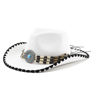 Close-up of white wool cowboy hat with colorful beaded band and turquoise metal disc