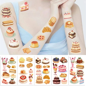 Detail showing colorful dessert tattoos including cake and pudding on model's skin