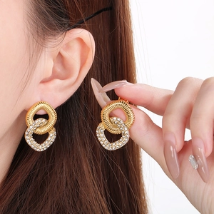 Luxurious gold square stud earrings with pave crystals and twisted rope metal design