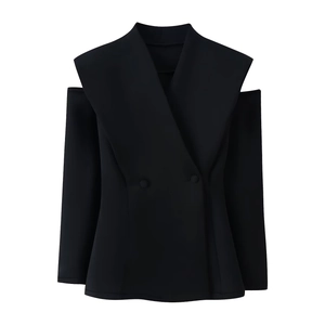 Detail view of black double-breasted blazer with unique cut-out shoulder design