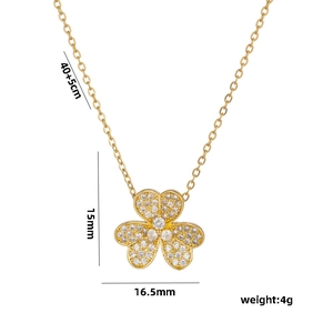 Gold plated clover pendant necklace with sparkling pave zircons and 45cm adjustable chain