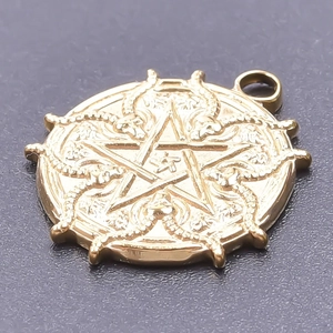 Macro shot of 18k gold plated stainless steel goat head pentagram and snake relief pendant