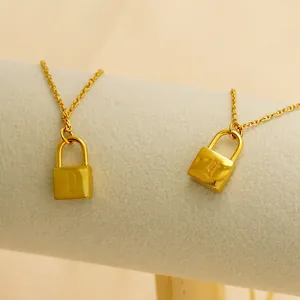 Minimalist gold lock pendant necklaces with gothic D and L initial engravings