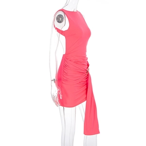 Detail view of pink bodycon dress featuring ruched sides and asymmetric hanging strap