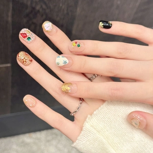 Handmade press-on nails with luxury champagne gold and black starry flower 3D design