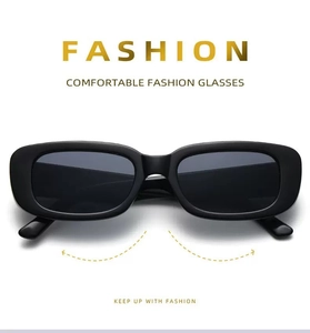 Detailed top view of retro small rectangle sunglasses with sleek black frame and dark lenses