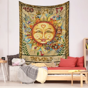 Detail of The World tarot tapestry showing floral sun art and bohemian bedroom wall decor