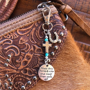 Western saddle and bridle charm clip with turquoise beads on leather horse handbag