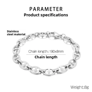 Macro detail of polished stainless steel chain link bracelet with oval link toggle design
