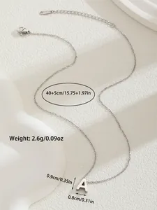 Detailed view of silver letter A pendant necklace with measurements on white background