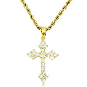Détail d'un pendentif croix dorée avec pierres de zircon et chaîne torsadée