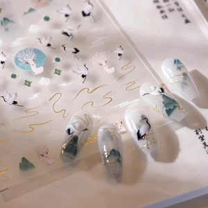 Oriental style nail stickers featuring cranes and landscape motifs for elegant manicure