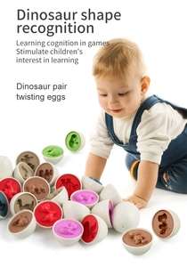 Close-up of child playing with dinosaur shape matching eggs for color and shape learning