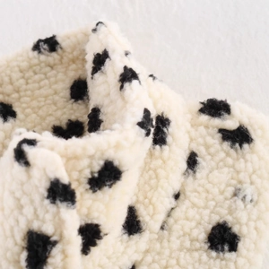 Women's heart print fleece jacket in black and white polka dot textured fabric