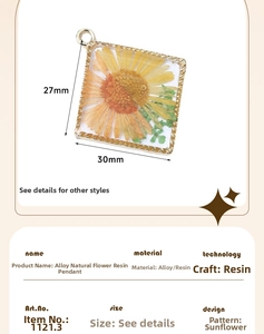Close-up of a 30mm square resin pendant with a real sunflower and golden alloy border