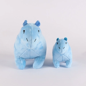 Detailed comparison of large and small blue capybara plush toys in soft material