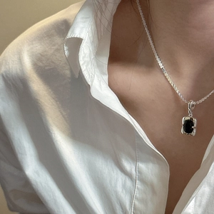 Minimalist S925 sterling silver necklace with square black onyx pendant worn on model