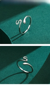 Detailed view of 925 sterling silver snake ring with smooth texture and adjustable band