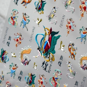 Macro detail of 5D embossed nail stickers featuring Dunhuang Feitian cultural motifs