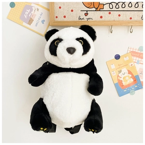 Detail of cute panda plush backpack with soft faux fur texture and adjustable straps