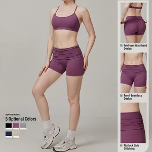 Ensemble de yoga violet pour femmes avec brassière et short à taille haute repliée